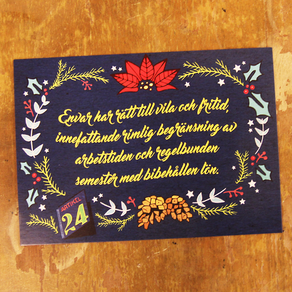 Artikel-joulukortti pöydällä