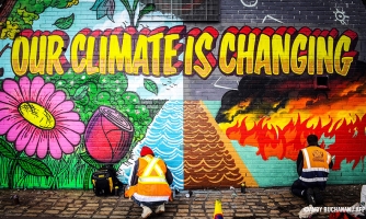 Graffiti, jossa lukee: "Our climate is changing!"