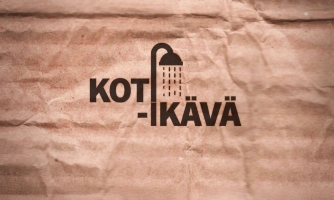 Aaltopahvin päällä teksti: "Koti-ikävä" sekä suihkukuvake.